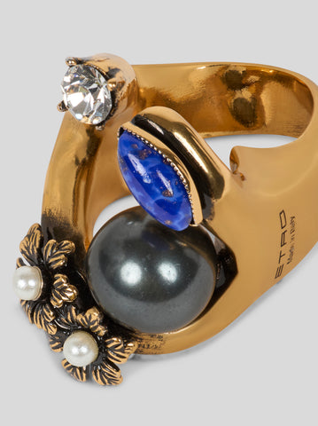 Ring with appliqués